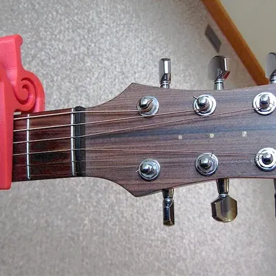 Capo guitar một tay dạng khối duy nhất