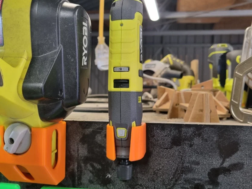 Giá đỡ công cụ quay Ryobi 4V gắn tường - Image 1