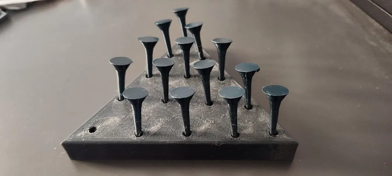 Trò chơi xếp hình chóp tam giác Peg Solitaire - Image 1