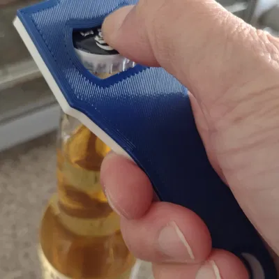 Mở nắp chai bằng tay nối với logo Subaru