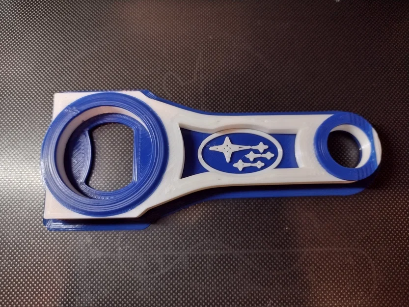 Mở nắp chai bằng tay nối với logo Subaru - Image 3