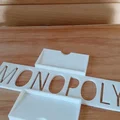 Giá đỡ thẻ cơ hội và cộng đồng trong trò chơi Monopoly - Thumbnail 1