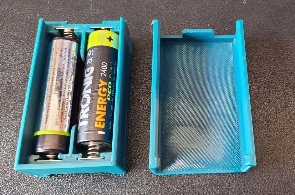 Bộ pin AA hai viên với nắp trượt một chiều - Image 1