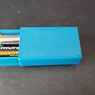 Bộ pin AA hai viên với nắp trượt một chiều