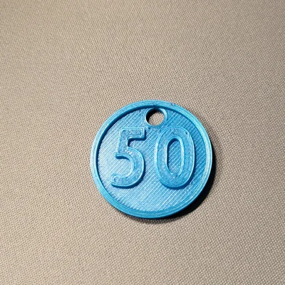 Huy chương số 50 với lỗ treo dây