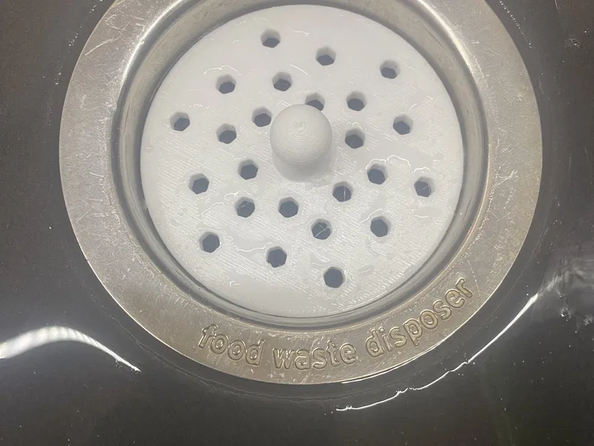 Nút chặn cho máy xay Insinkerator ngăn cản vật lạ - Image 1