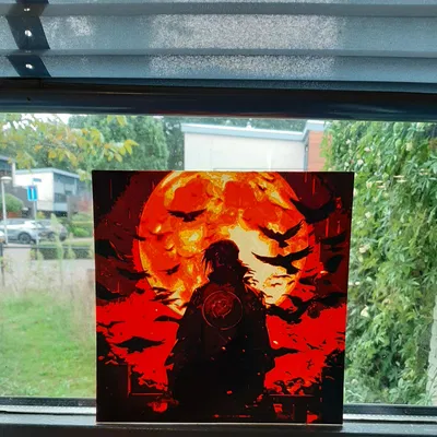 Itachi trong Naruto Shippuden bên ánh trăng lớn