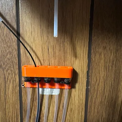 Giá đỡ ống PTFE gắn tường cho Prusa MMU2S/MMU3 với ốc vít