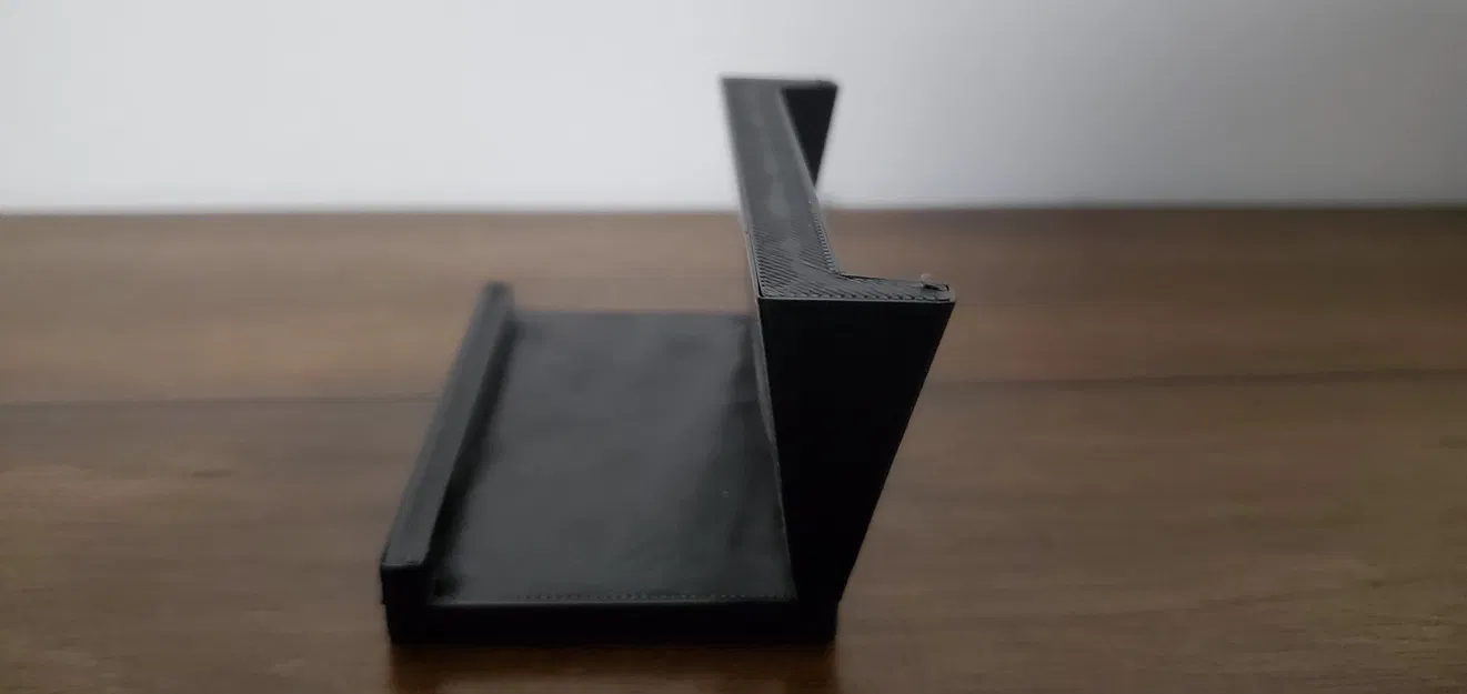 Giá đỡ điện thoại trừu tượng với vành giữ chống trượt - Image 1