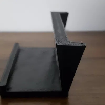 Giá đỡ điện thoại trừu tượng với vành giữ chống trượt