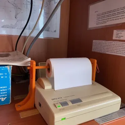 Giá đỡ cuộn giấy cho máy in Navtex DPU-414