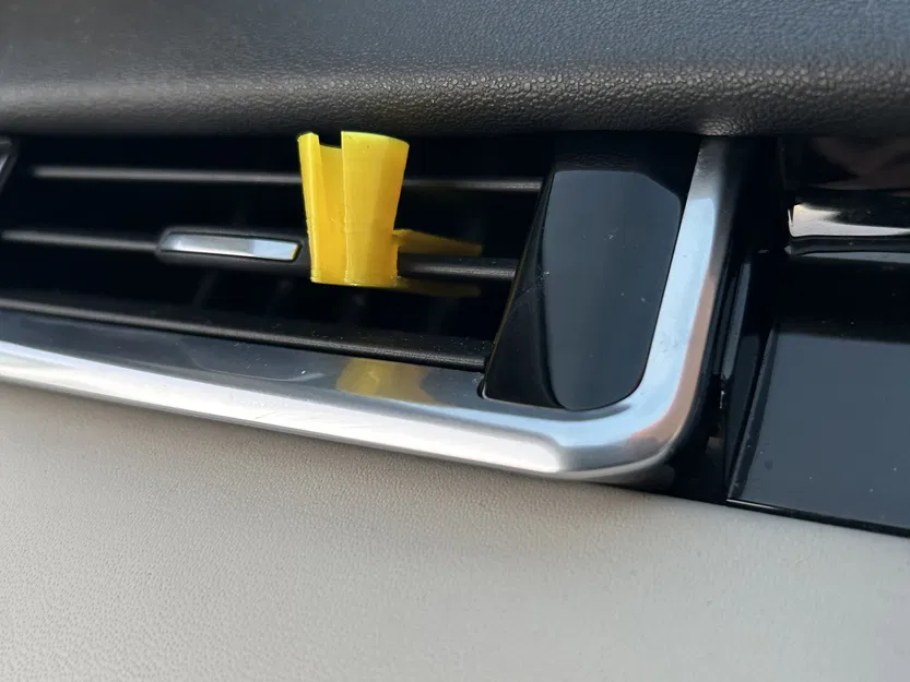 Giá đỡ cáp ô tô gắn vào lỗ thông gió - Image 1