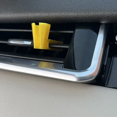 Giá đỡ cáp ô tô gắn vào lỗ thông gió