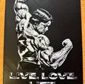 Hình ảnh Arnold Schwarzenegger trong tư thế bicep đôi - Thumbnail 1