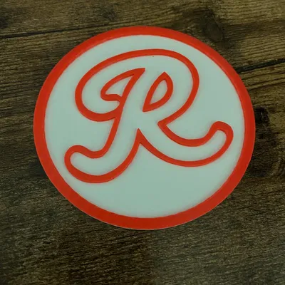 Đế ly phong cách logo bia Rainier