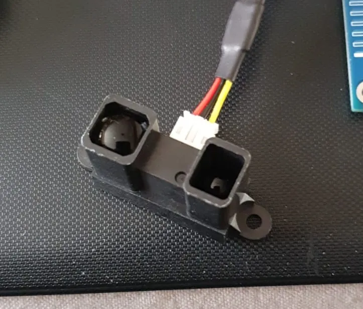 Vỏ và giá đỡ cảm biến Sharp cho máy chơi phi tiêu - Image 1