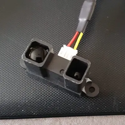 Vỏ và giá đỡ cảm biến Sharp cho máy chơi phi tiêu