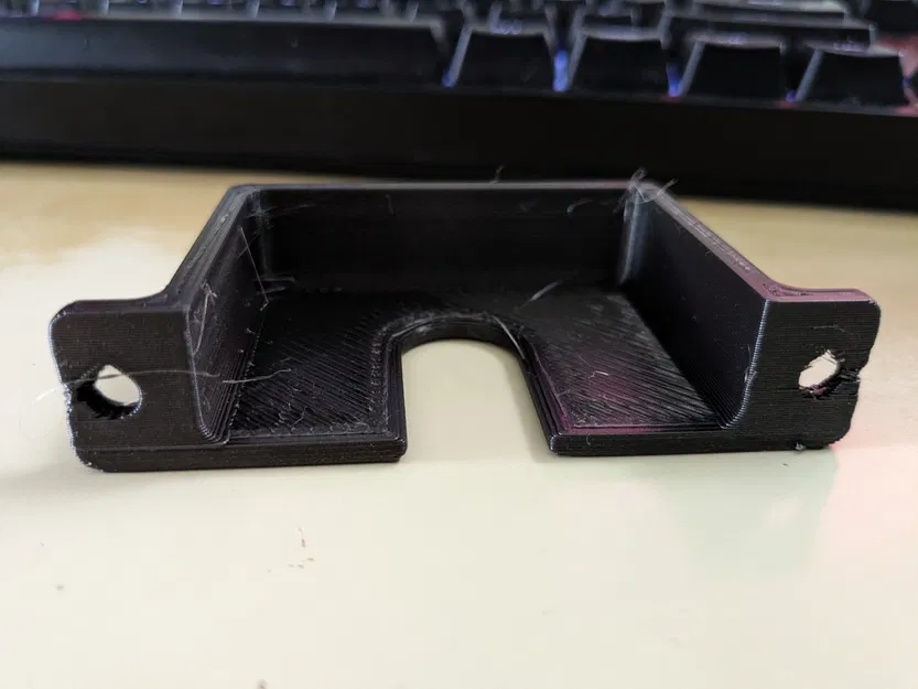 Giá đỡ ổ cắm điện với lỗ hình giọt nước - Image 1