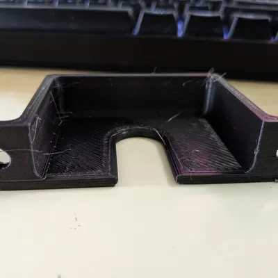 Giá đỡ ổ cắm điện với lỗ hình giọt nước