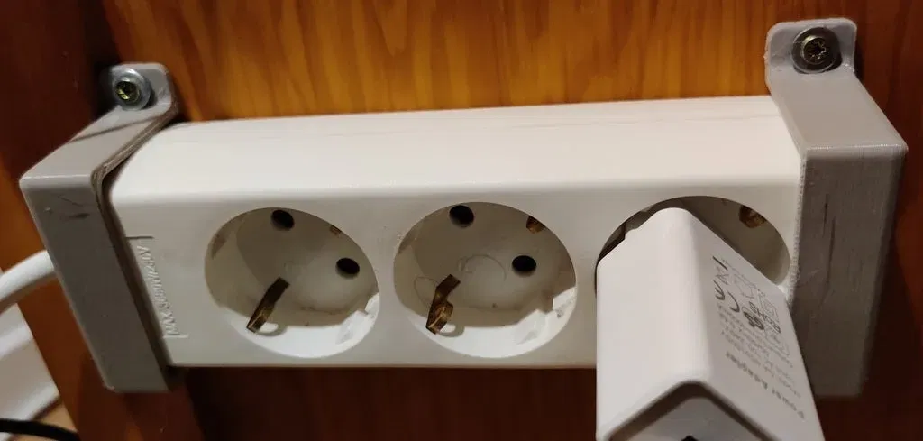 Giá đỡ cho ổ cắm điện gắn tường hoặc bàn - Image 1