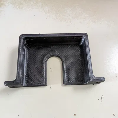 Giá đỡ ổ cắm điện với lỗ hình giọt nước