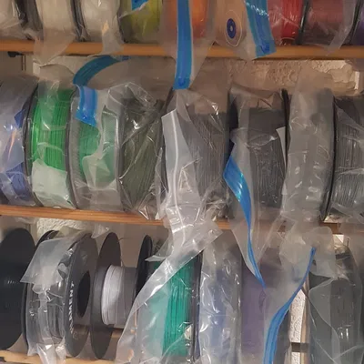 Giá đỡ cho thanh tròn trong tổ chức cuộn filament