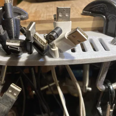 Giá đỡ cáp gập cho mép bàn làm việc