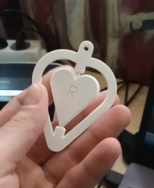 Móc khóa hình trái tim có khả năng xoay - Image 1
