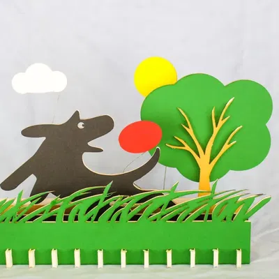 Cảnh chơi đùa tại công viên chó với thiết kế laser cắt