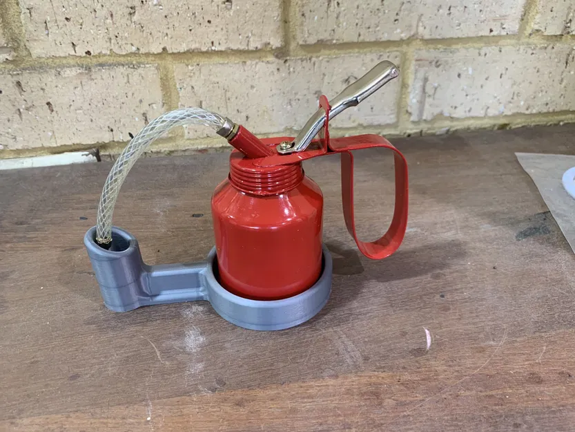 Giá đỡ bình dầu nhỏ chống rò rỉ - Image 1