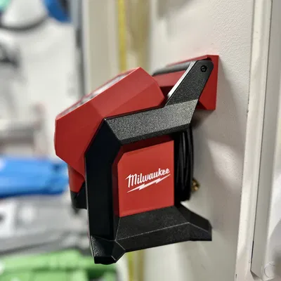 Giá treo máy bơm hơi Milwaukee M12 trên tường