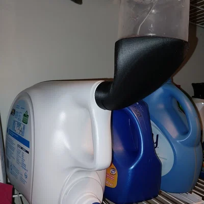 Côn thoát nước cho cốc đo bột giặt tránh tích tụ bột giặt