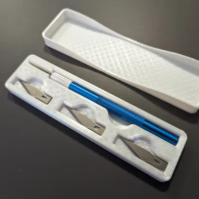 Bao đựng dao cắt và 24 lưỡi dự phòng