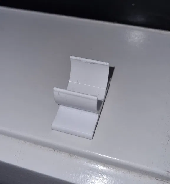 Giá đỡ rèm cuốn chống bay trong gió - Image 1