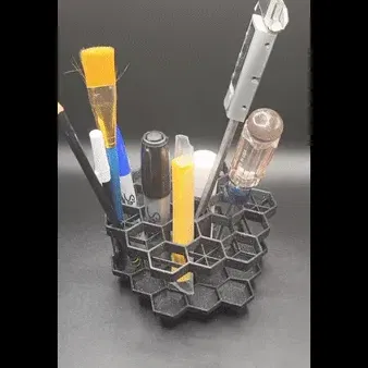 Tổ chức không gian làm việc với giá đỡ hình lục giác xoay