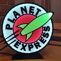 Biểu tượng Planet Express phát sáng trong Futurama - Thumbnail 1