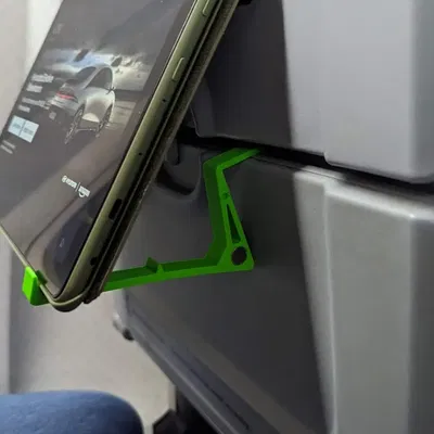 Giá đỡ thiết bị gắn vào bàn ăn trên máy bay