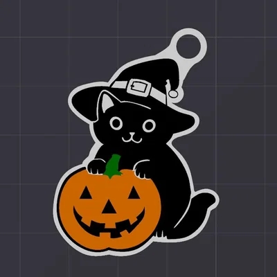 Móc khóa mèo Halloween ngồi trên bí ngô