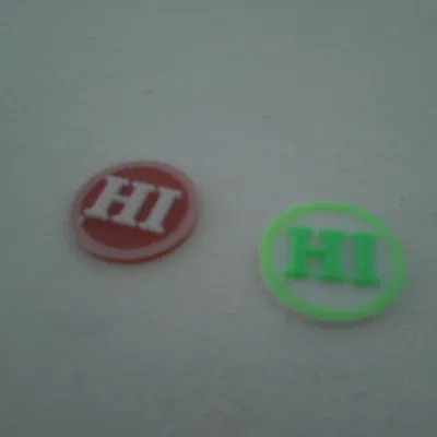 Đồng xu nhỏ có chữ HI