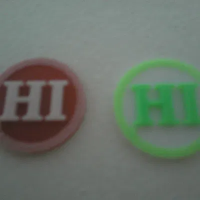 Đồng xu nhỏ có chữ HI