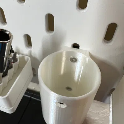 Giá đỡ Worx WX240 lắp đặt trên tường Skadis