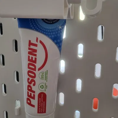 Giá đỡ kem đánh răng treo skadis