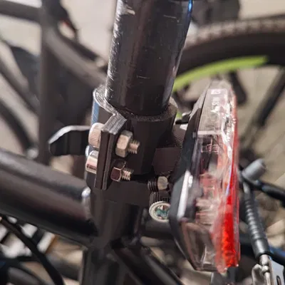 Giá đỡ đèn hậu cho yên xe đạp