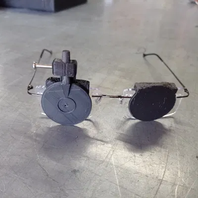 Kính che mắt và kính chỉnh thị lực gắn vào kính ISSF