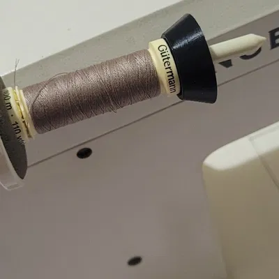 Giá đỡ cuộn chỉ cho máy may Singer