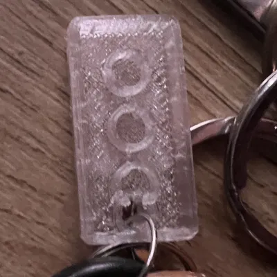 Móc khóa LEGO kết hợp với gạch xây dựng