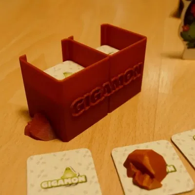 Giá đỡ thẻ Gigamons và 3 viên đá trong trò chơi bàn