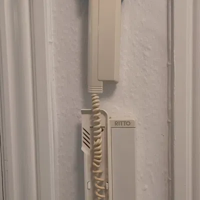 Giá đỡ điện thoại intercom gắn tường không bị làm phiền