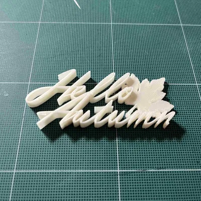 Văn bản trang trí "Xin chào Mùa thu" với lá cây