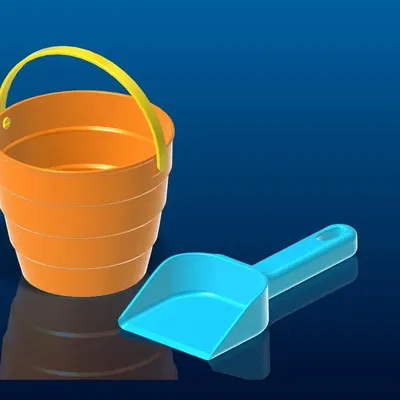 Xô và xẻng cát cho trẻ em chơi ở bãi biển